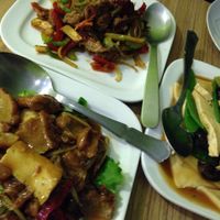 tofu with black mushrooms, ginger chicken and beef with peppers  at Vege Saveurs in Paris