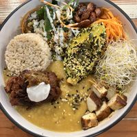Wholefood bowl with dhal & onion bhaji   at Veggie Vie in Adelaide