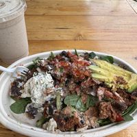 Breakfast burrito on greens  at Thrive Juice Bar and Kitchen in Bar Harbor