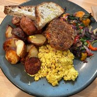 Vegan Farmer’s Choice (sourdough toast, potatoes, tofu scramble, veggie sausage, veggie hash)  at The Farmer's Daughter in North Easton