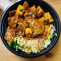 Saucy tofu, vegan meat, and salad on rice at Wei's Noodle House in Ottawa