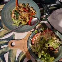 Ceaser salad, pasta with mushroom sauce at Kiwi Vegan Cafe in Tbilisi
