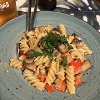 Pasta with mushroom sauce  at Kiwi Vegan Cafe in Tbilisi