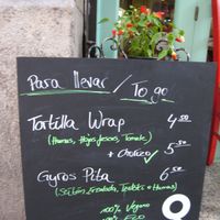 Price board for take-away at Casa Griega in Barcelona