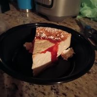 Our vegan cheesecake stuck to the lid of the container a bit, but it was still delicious! at Triangle Tavern in Philadelphia