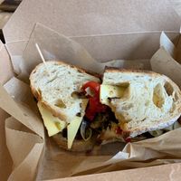 Delicious eggplant roasted red pepper with cheese on sourdough bread at Not Only Juice in Willimantic