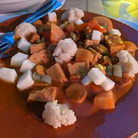 a mix of vegetables, vegan cheese and vegan sausage at Francesinhas Al Forno da Baixa in Porto