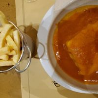 Curry francesinha at Francesinhas Al Forno da Baixa in Porto