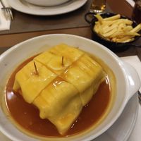 Francesinha de seitan at Francesinhas Al Forno da Baixa in Porto