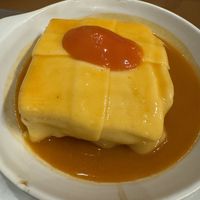 Tempeh with vegan cheese  at Francesinhas Al Forno da Baixa in Porto