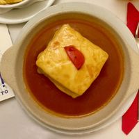 Seitan Francesinha with vegan cheese at Francesinhas Al Forno da Baixa in Porto