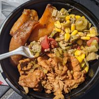 Ginger "chicken," sweet plantains, and okra corn & tomato side dish at The Nile Cafe in Philadelphia