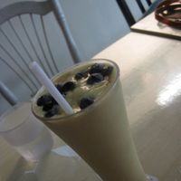 This smoothie is called the Bubble Tea and contains blueberry 'bubbles', peaches, maple syrup and soy milk. I thought it was quite amazing.  at Le Doggy Cafe in Montreal
