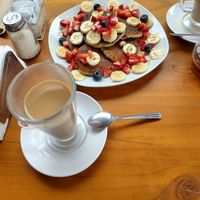 Vegan pankakes and oat cappuccino at Fruzion in Paracas