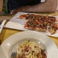 carbonara and mushroom pizza at Buddy VEGGY in Rome