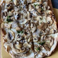 Vegan pizza with truffles at Buddy VEGGY in Rome