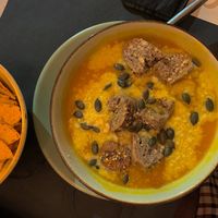 pumpkin creamy soup with vegan cheese  at Buddy VEGGY in Rome