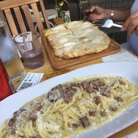 Carbonara and 4 cheese pizza   at Buddy VEGGY in Rome
