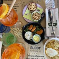 Vegan chicken nuggets and snacks with Aperols  at Buddy VEGGY in Rome
