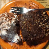 Brownies with hazelnuts and fresh cream at Buddy VEGGY in Rome