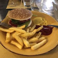 Vegetarian burger and chips at Buddy VEGGY in Rome