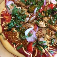 vegan cheese and sausage options  at PizzaRev in Palmdale