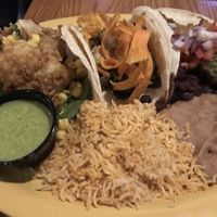 Taco Plato: sadly every single item on this plate was hella bland and unseasoned   at Tex Tubb's Taco Palace in Madison