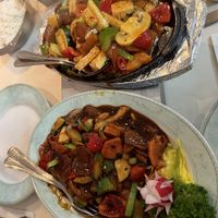 Dish with ‘chicken’, ‘octopus’ and ‘sausage’ and dish with soy slices  at De Oude Plek in Rotterdam