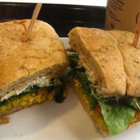 TOFU SCRAMBLE SANDWICH on Organic Kamut Ciabatta (Organic seasoned tofu, red peppers, onions, lettuce, tomato, alfalfa sprouts, vegenaise). It is quite good. at Copper Branch - 600 Maisonneuve W/O in Montreal