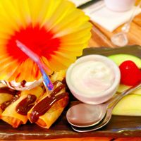 Banana Rolls with Coconut Cream and Ice Creamm  at Golden Lotus Vegan in Newtown