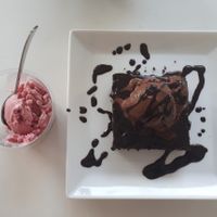 Chocolate brownie with chocolate and raspberry coconut ice cream at Smokey's The Brownie Bar in Colombo