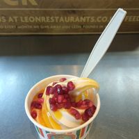 Passion fruit, lemongrass and pomegranate topping on vegan soft serve. Excellent! at LEON - Bankside in South East London