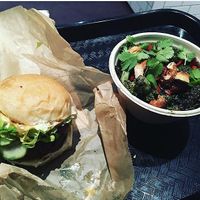 Burger and side dish at Superiority Burger in New York City