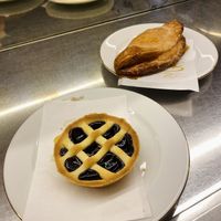 Vegan blueberry tart and I forget the name of the other pastry but it was filled with a sweet rice. Sooooo good!   at Pasticceria Gualtieri in Florence