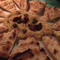 favs bean humus with capers and sun-dried tomato served with homemade pitta at Appaloosa in Mykonos