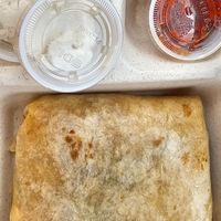 Vegan burrito & sour cream at Mad Mex in Erie