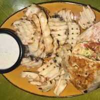 Yummy burrito and fries  at Mad Mex in Erie