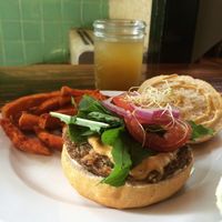 Quinoaburguer, served with vegan cheddar and sweet potato fries at FOREVER in Mexico City