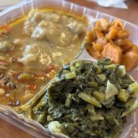 I chose the greens, sweet potatoes, black-eyed peas, and savory protein in gravy.  It was also served with soup and cornbread. All vegan!   at Daisy's Catering Cafe in South Holland