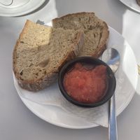 Tostada grande con aceite y tomate  at Recyclo Bike Cafe in Malaga