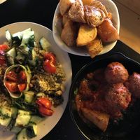 ‘Sir Bradley Wiggins’ salad and vegan meatballs (comes with patatas bravas). Both medium portions at Recyclo Bike Cafe in Malaga