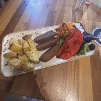 Chorizos veganos (with vegan mayo in the background)  at Recyclo Bike Cafe in Malaga