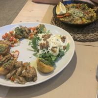 Provenzal dish in the front, paella in the back   at Vegetalia - Born in Barcelona