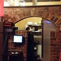 Bell at top of photo... Great decor! at Camino Real Kitchen and Tequila in Bakersfield