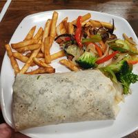burrito with 2 sides at Camino Real Kitchen and Tequila in Bakersfield
