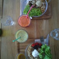 Andine salad (quinoa+goat cheese+ dried grapes) and Beyrouth salad (boulghour+zucchini hummous+chickpeas+roasted eggplant) with both green and energy juice at ÖST café in Besancon