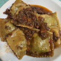 Reviolones de espinaca, ricota acompañado de ragout  at Casa Munay in Buenos Aires