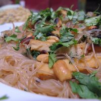 Munay Thai with rice noodles that came with tofu, onions, peanuts, cilantro, and soy sauce at Casa Munay in Buenos Aires