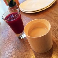 The Zend house drink with a chaser of cranberry juice. A alcohol free way to take the edge off the day. at Zend Conscious Lounge in Vancouver