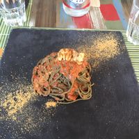 Seaweed spaghetti with tomato and walnut sauce  at Cavoli Nostri in Naples